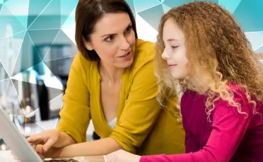 Mother and daughter at laptop
