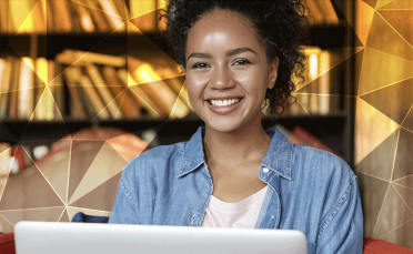 Woman at computer working on micro-credentials