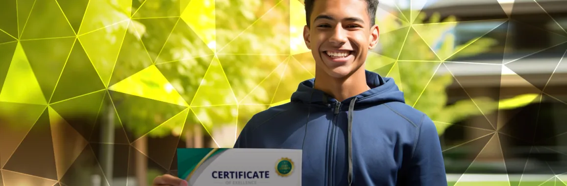 student holding certificate