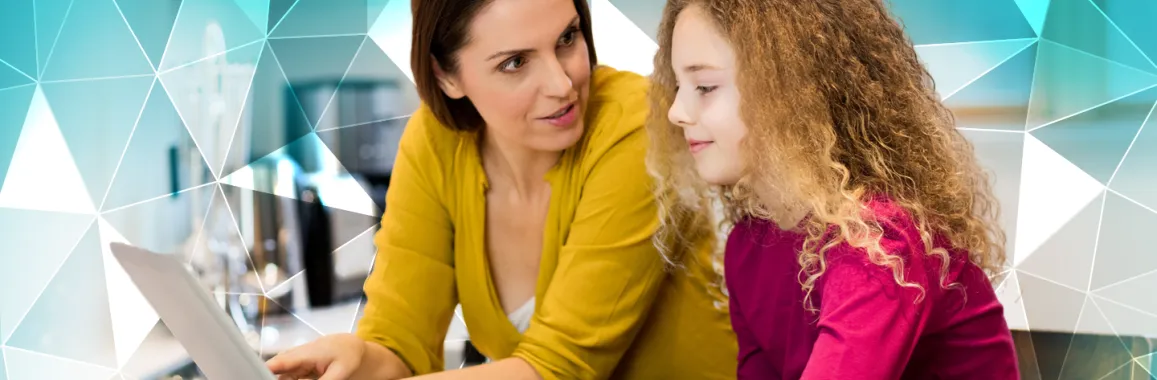 Mother and daughter at laptop