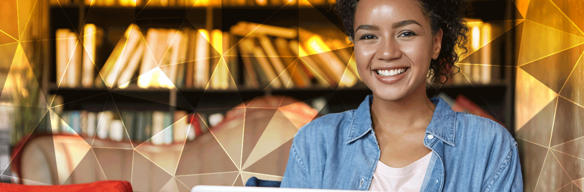 Woman at computer working on microcredentials