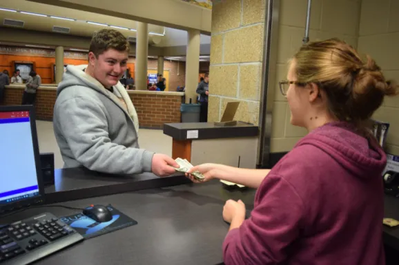 students counting money